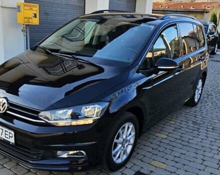 Черный Фольксваген Туран, объемом двигателя 1.6 л и пробегом 197 тыс. км за 14650 $, фото 1 на Automoto.ua