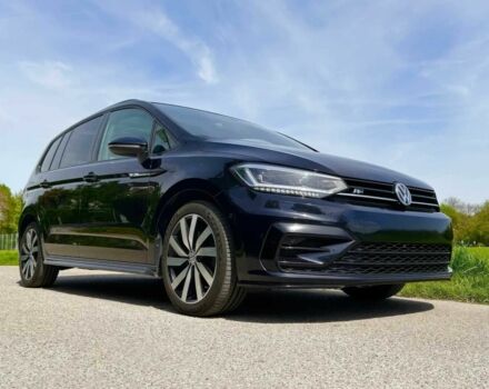 Черный Фольксваген Туран, объемом двигателя 2 л и пробегом 49 тыс. км за 12100 $, фото 1 на Automoto.ua