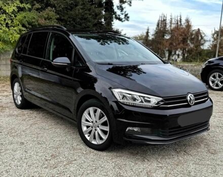 Черный Фольксваген Туран, объемом двигателя 2 л и пробегом 44 тыс. км за 12000 $, фото 1 на Automoto.ua