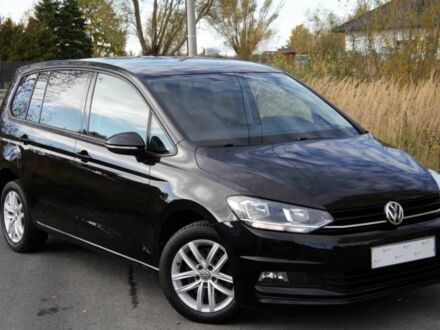 Черный Фольксваген Туран, объемом двигателя 1.6 л и пробегом 89 тыс. км за 12300 $, фото 1 на Automoto.ua