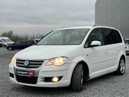 Черный Фольксваген Туран, объемом двигателя 2 л и пробегом 197 тыс. км за 6490 $, фото 1 на Automoto.ua