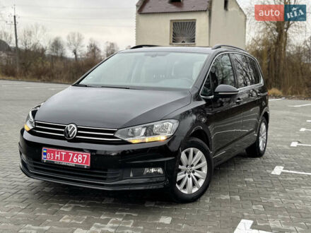 Черный Фольксваген Туран, объемом двигателя 1.97 л и пробегом 207 тыс. км за 20000 $, фото 1 на Automoto.ua