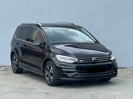 Чорний Фольксваген Туран, об'ємом двигуна 2 л та пробігом 15 тис. км за 10000 $, фото 1 на Automoto.ua