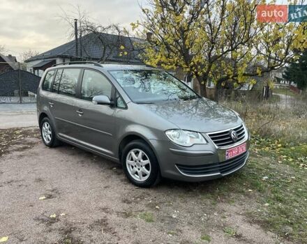 Коричневий Фольксваген Туран, об'ємом двигуна 1.4 л та пробігом 190 тис. км за 7333 $, фото 1 на Automoto.ua
