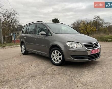 Коричневий Фольксваген Туран, об'ємом двигуна 1.4 л та пробігом 190 тис. км за 7333 $, фото 87 на Automoto.ua