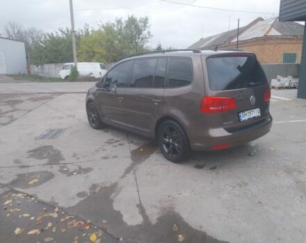 Коричневый Фольксваген Туран, объемом двигателя 1.4 л и пробегом 190 тыс. км за 11000 $, фото 1 на Automoto.ua