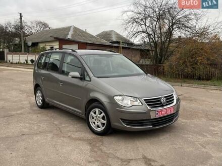 Коричневый Фольксваген Туран, объемом двигателя 1.4 л и пробегом 190 тыс. км за 7333 $, фото 1 на Automoto.ua