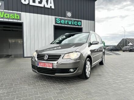 Фольксваген Туран 2009 в Луцке на Automoto.ua Коричневый Фольксваген Туран, объемом двигателя 1.4 л и пробегом 223 тыс. км за 7350 $, фото 1 на Automoto.ua