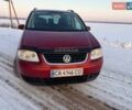 Красный Фольксваген Туран, объемом двигателя 1.9 л и пробегом 330 тыс. км за 5800 $, фото 1 на Automoto.ua