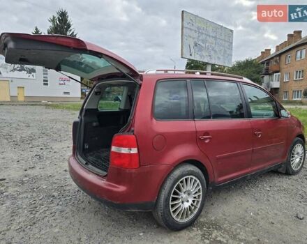 Червоний Фольксваген Туран, об'ємом двигуна 1.97 л та пробігом 387 тис. км за 4900 $, фото 3 на Automoto.ua