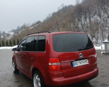 Червоний Фольксваген Туран, об'ємом двигуна 1.9 л та пробігом 340 тис. км за 4750 $, фото 4 на Automoto.ua