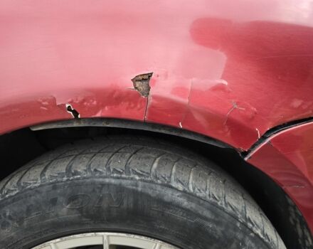 Красный Фольксваген Туран, объемом двигателя 2 л и пробегом 378 тыс. км за 4800 $, фото 9 на Automoto.ua