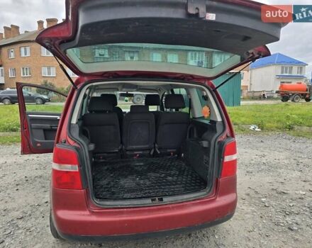 Червоний Фольксваген Туран, об'ємом двигуна 1.97 л та пробігом 387 тис. км за 4900 $, фото 13 на Automoto.ua