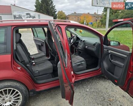 Червоний Фольксваген Туран, об'ємом двигуна 1.97 л та пробігом 387 тис. км за 4900 $, фото 14 на Automoto.ua