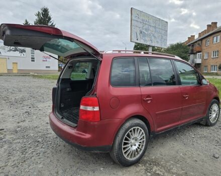 Красный Фольксваген Туран, объемом двигателя 2 л и пробегом 378 тыс. км за 4800 $, фото 2 на Automoto.ua