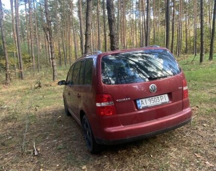 Красный Фольксваген Туран, объемом двигателя 2 л и пробегом 355 тыс. км за 4800 $, фото 2 на Automoto.ua