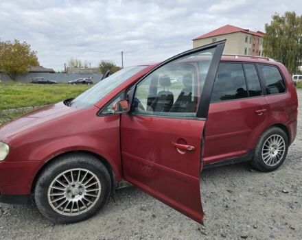 Красный Фольксваген Туран, объемом двигателя 2 л и пробегом 378 тыс. км за 4800 $, фото 4 на Automoto.ua