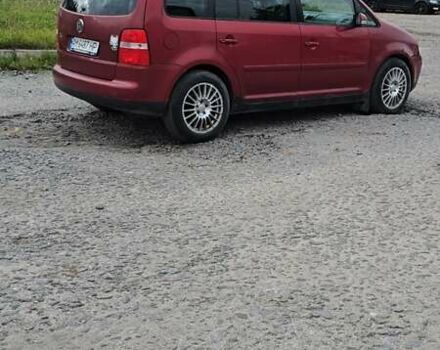 Червоний Фольксваген Туран, об'ємом двигуна 1.97 л та пробігом 387 тис. км за 4900 $, фото 6 на Automoto.ua