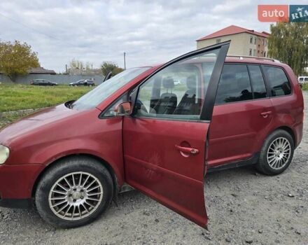 Червоний Фольксваген Туран, об'ємом двигуна 1.97 л та пробігом 387 тис. км за 4900 $, фото 2 на Automoto.ua