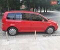 Красный Фольксваген Туран, объемом двигателя 1.9 л и пробегом 350 тыс. км за 6200 $, фото 2 на Automoto.ua