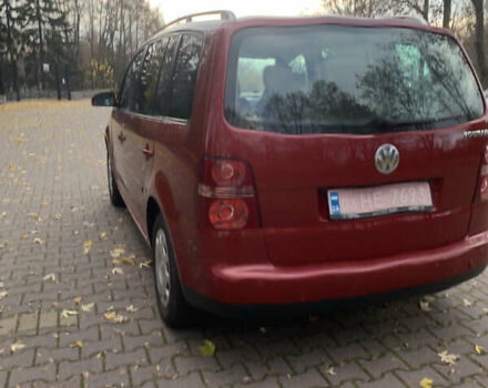 Красный Фольксваген Туран, объемом двигателя 1.6 л и пробегом 248 тыс. км за 5600 $, фото 3 на Automoto.ua