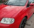 Червоний Фольксваген Туран, об'ємом двигуна 2 л та пробігом 233 тис. км за 5100 $, фото 1 на Automoto.ua