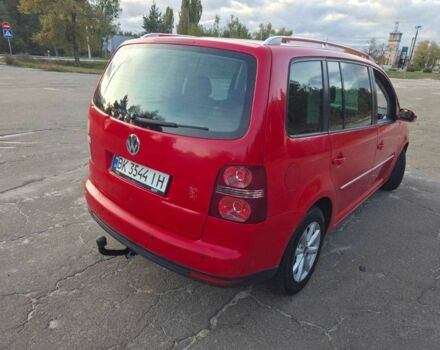 Красный Фольксваген Туран, объемом двигателя 2 л и пробегом 340 тыс. км за 4200 $, фото 11 на Automoto.ua