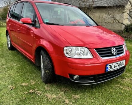 Красный Фольксваген Туран, объемом двигателя 1.6 л и пробегом 260 тыс. км за 6200 $, фото 1 на Automoto.ua