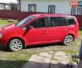 Красный Фольксваген Туран, объемом двигателя 1.4 л и пробегом 207 тыс. км за 5000 $, фото 1 на Automoto.ua