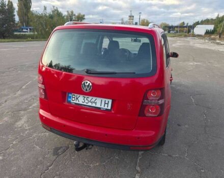 Красный Фольксваген Туран, объемом двигателя 2 л и пробегом 340 тыс. км за 4200 $, фото 10 на Automoto.ua