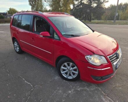 Красный Фольксваген Туран, объемом двигателя 2 л и пробегом 340 тыс. км за 4200 $, фото 4 на Automoto.ua