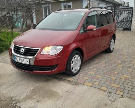 Червоний Фольксваген Туран, об'ємом двигуна 1.9 л та пробігом 315 тис. км за 6900 $, фото 1 на Automoto.ua