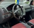 Красный Фольксваген Туран, объемом двигателя 1.39 л и пробегом 180 тыс. км за 6400 $, фото 6 на Automoto.ua