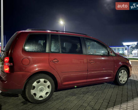 Червоний Фольксваген Туран, об'ємом двигуна 1.9 л та пробігом 314 тис. км за 7000 $, фото 3 на Automoto.ua