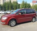 Красный Фольксваген Туран, объемом двигателя 1.4 л и пробегом 254 тыс. км за 6999 $, фото 46 на Automoto.ua