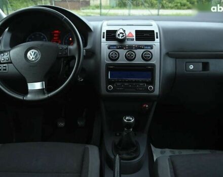 Красный Фольксваген Туран, объемом двигателя 1.4 л и пробегом 193 тыс. км за 6500 $, фото 27 на Automoto.ua