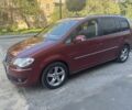 Красный Фольксваген Туран, объемом двигателя 2 л и пробегом 260 тыс. км за 6200 $, фото 1 на Automoto.ua