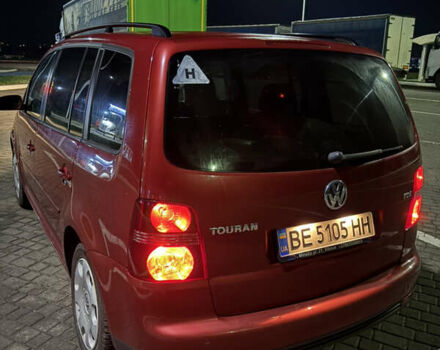 Червоний Фольксваген Туран, об'ємом двигуна 1.9 л та пробігом 314 тис. км за 7000 $, фото 1 на Automoto.ua