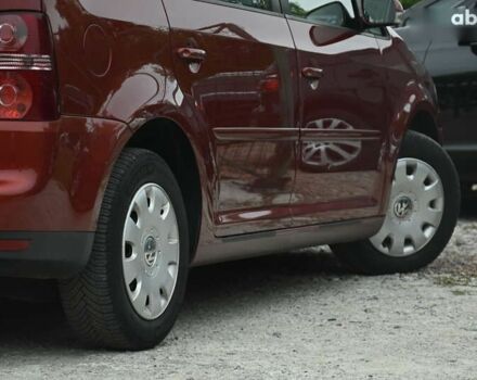 Красный Фольксваген Туран, объемом двигателя 1.4 л и пробегом 193 тыс. км за 6500 $, фото 11 на Automoto.ua