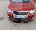Червоний Фольксваген Туран, об'ємом двигуна 1.98 л та пробігом 235 тис. км за 8199 $, фото 1 на Automoto.ua