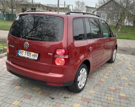 Червоний Фольксваген Туран, об'ємом двигуна 1.9 л та пробігом 315 тис. км за 6900 $, фото 4 на Automoto.ua