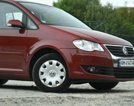 Красный Фольксваген Туран, объемом двигателя 1.4 л и пробегом 193 тыс. км за 6500 $, фото 2 на Automoto.ua