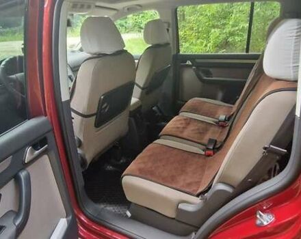 Красный Фольксваген Туран, объемом двигателя 1.97 л и пробегом 296 тыс. км за 7750 $, фото 1 на Automoto.ua