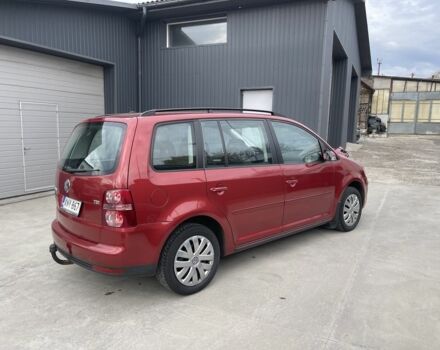 Красный Фольксваген Туран, объемом двигателя 1.9 л и пробегом 270 тыс. км за 7800 $, фото 1 на Automoto.ua