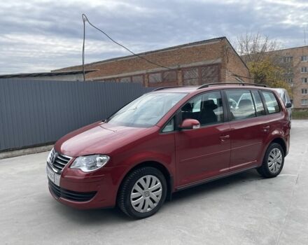 Красный Фольксваген Туран, объемом двигателя 1.9 л и пробегом 270 тыс. км за 7800 $, фото 2 на Automoto.ua