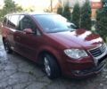 Червоний Фольксваген Туран, об'ємом двигуна 1.4 л та пробігом 241 тис. км за 7300 $, фото 1 на Automoto.ua