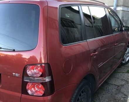 Червоний Фольксваген Туран, об'ємом двигуна 1.4 л та пробігом 241 тис. км за 7300 $, фото 3 на Automoto.ua