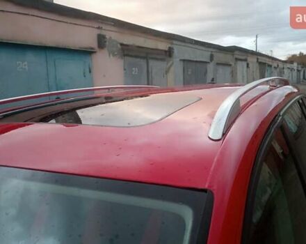 Красный Фольксваген Туран, объемом двигателя 1.39 л и пробегом 250 тыс. км за 6500 $, фото 4 на Automoto.ua