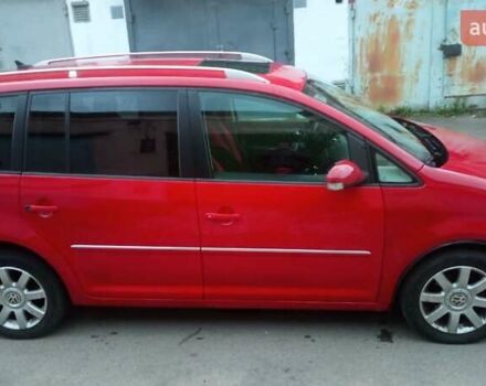 Красный Фольксваген Туран, объемом двигателя 1.39 л и пробегом 250 тыс. км за 6500 $, фото 17 на Automoto.ua