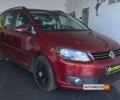 Красный Фольксваген Туран, объемом двигателя 1.6 л и пробегом 235 тыс. км за 9700 $, фото 1 на Automoto.ua